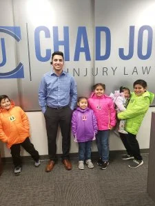 group of kids with thei new coats for Coats for Kids event