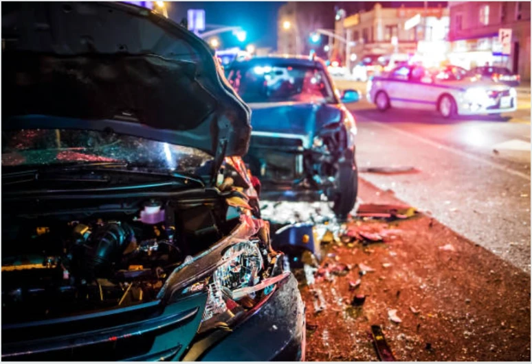 Two cars, with severe damage, involved in car accident.