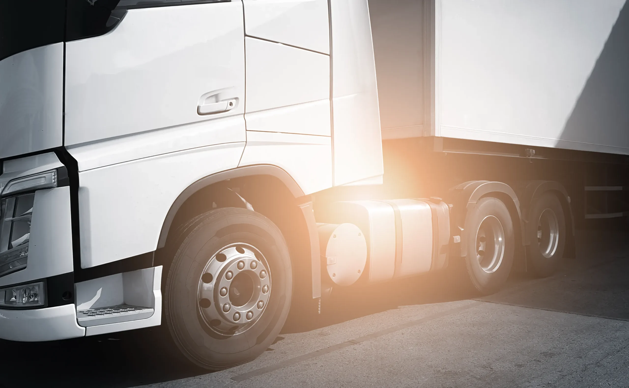 A semi truck about to jackknife.