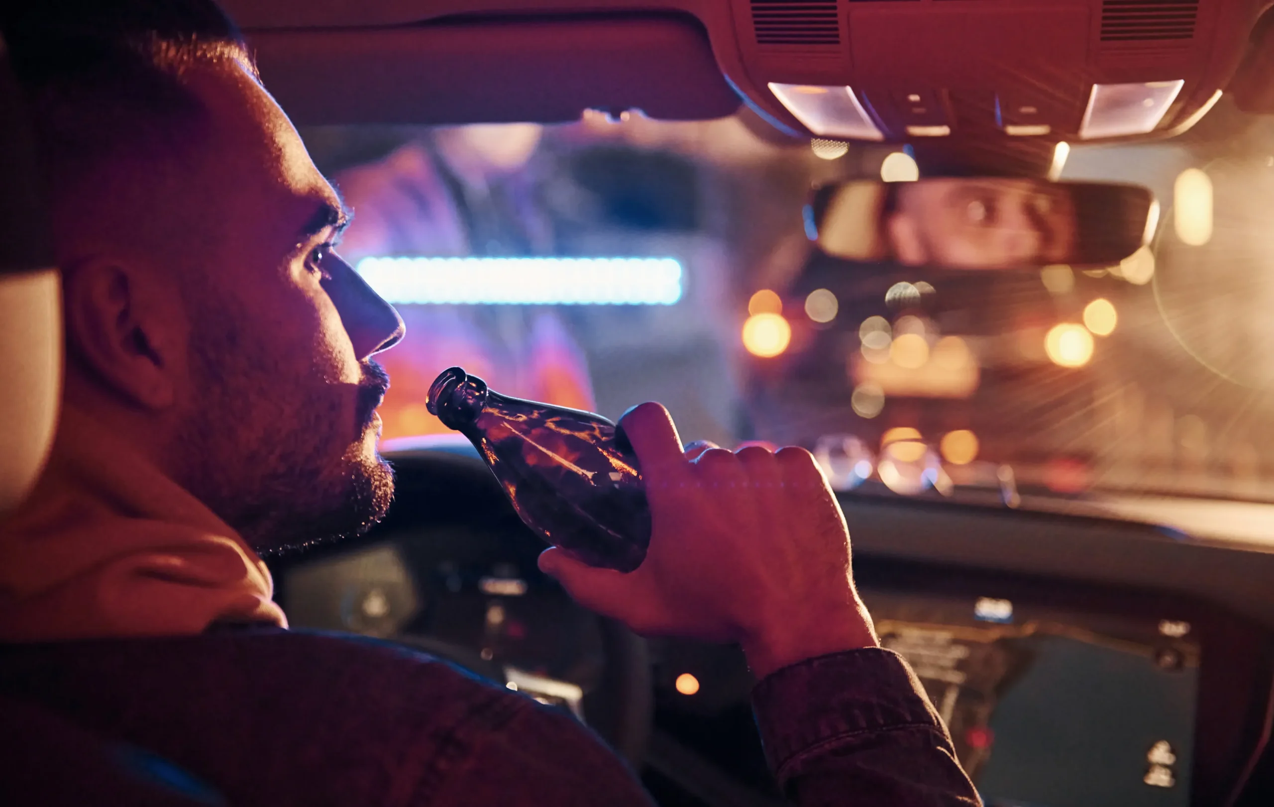 Driver, drinking while driving.