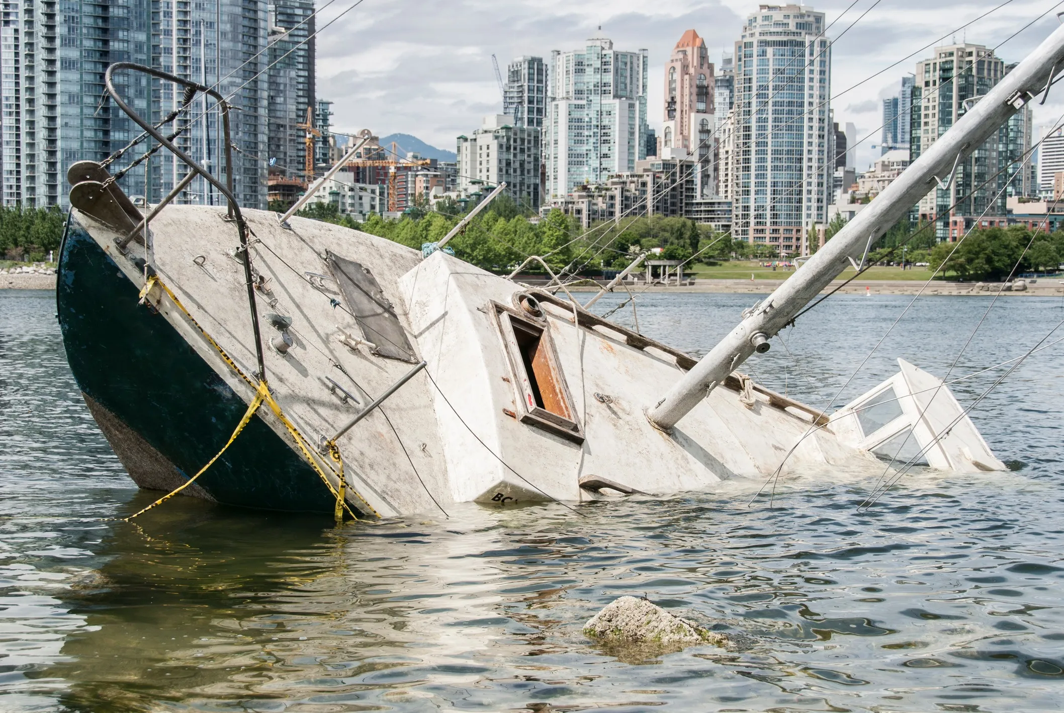 A boat sinking after being involved in an accident.